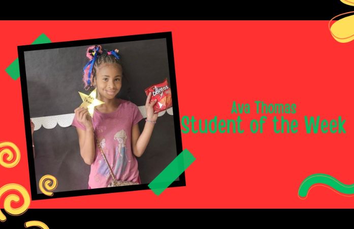 Student holding Gold Star and Treat for Excellence